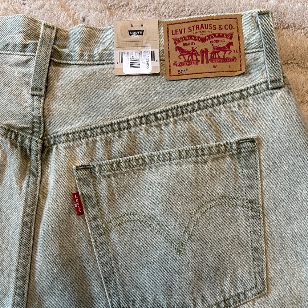 Levi's Women's 501 Original Blue Jean Shorts in a light wash. - Picture 5 of 9